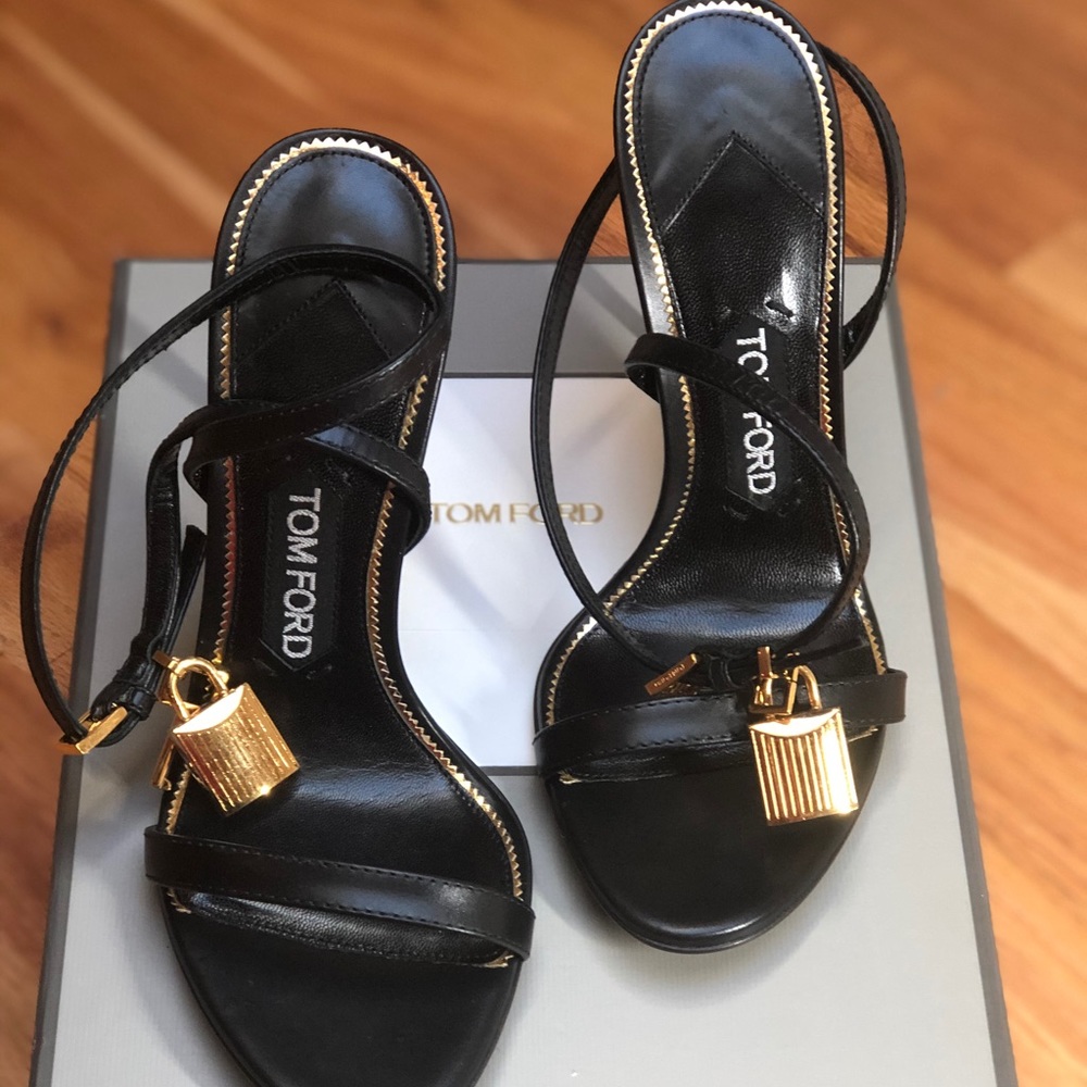Tom Ford black sandal with brass padlock and spike brass heel. Never worn. 37.5